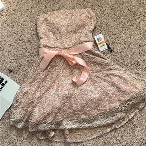 Short NEVER BEEN WORN formal dress from Macy’s.